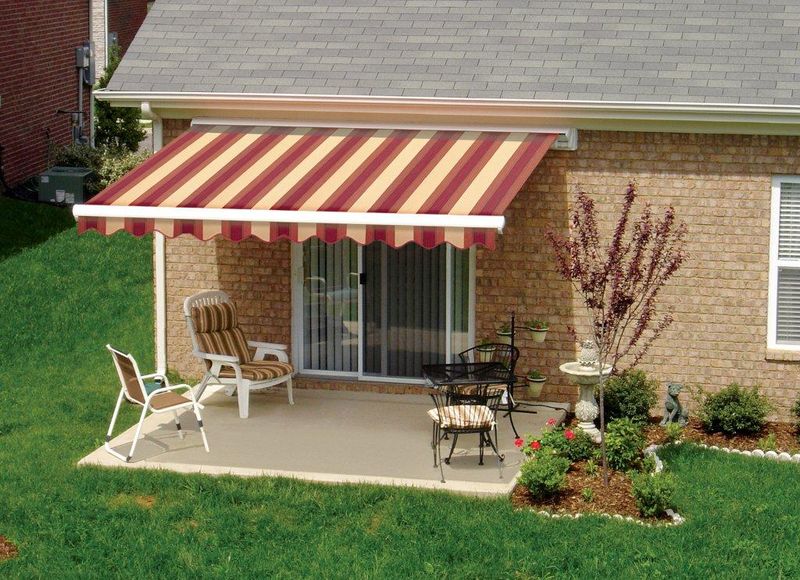 sunbrella striped awnings outside of commercial building