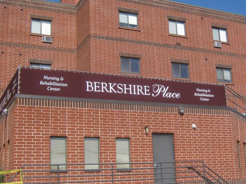 AdvertisingBanner1 striped awnings outside of commercial building