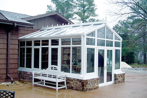 Conservatory1 striped awnings outside of commercial building
