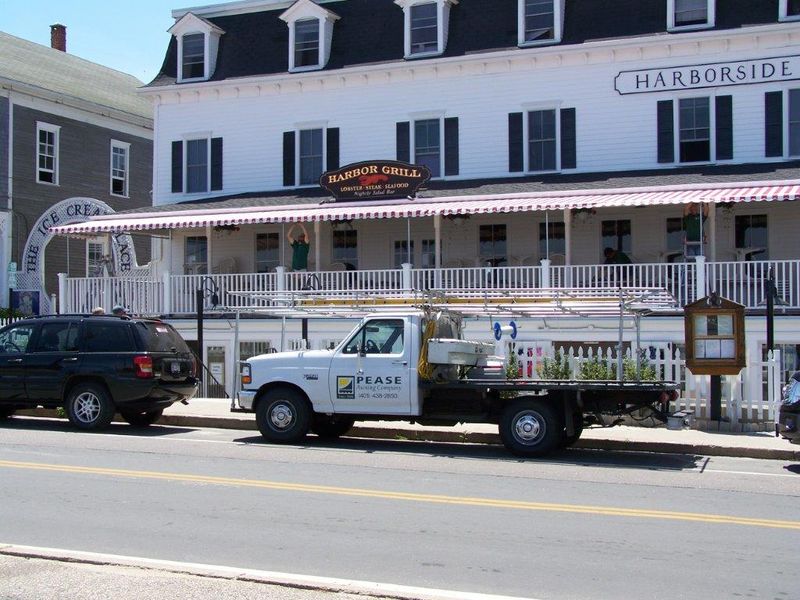 SeasonalService striped awnings outside of commercial building
